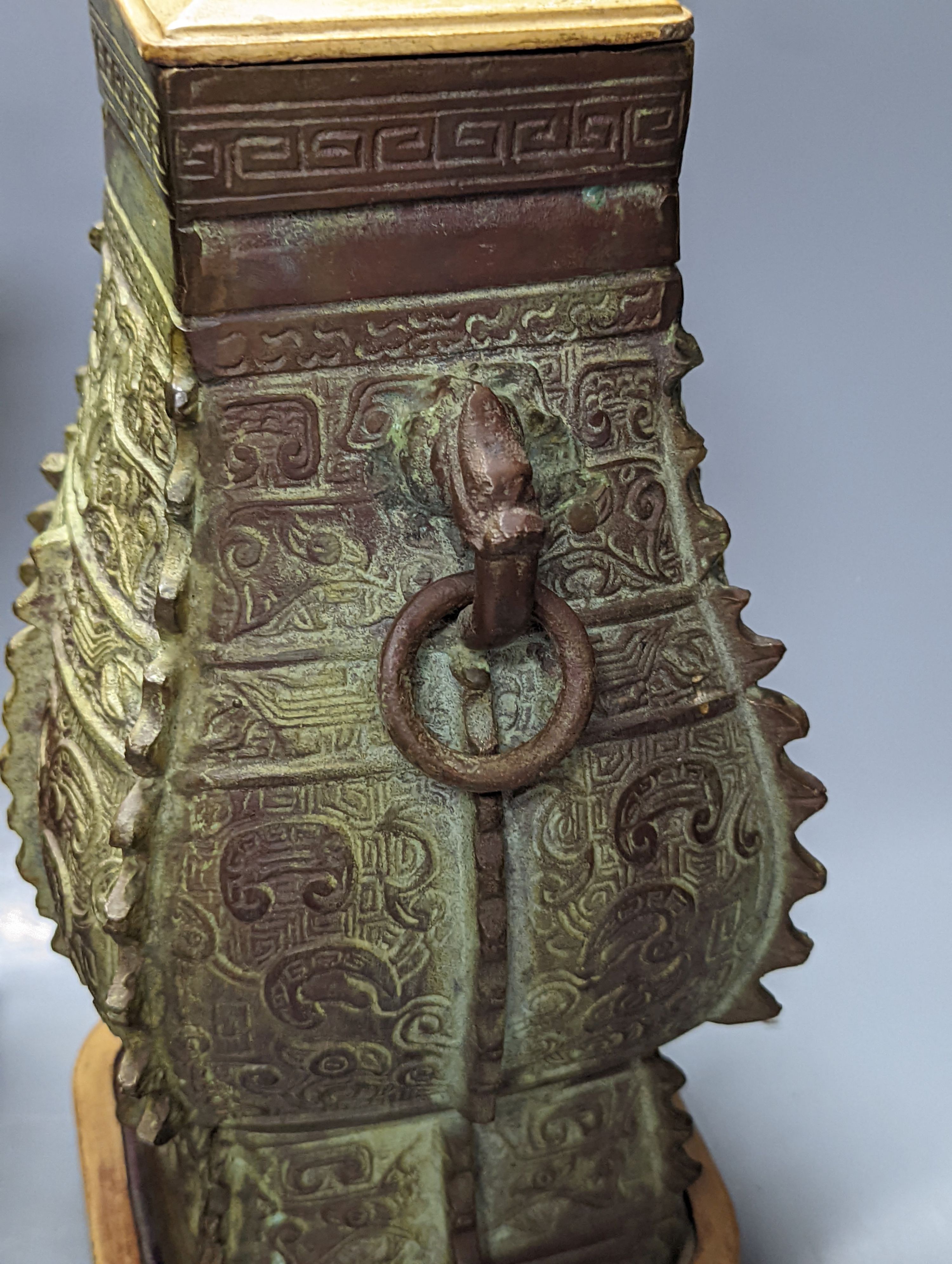 Two Chinese archaic style bronze lamp bases, 38 cm high to top of fitting